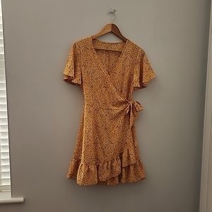 Short sleeve wrap around floral dress.